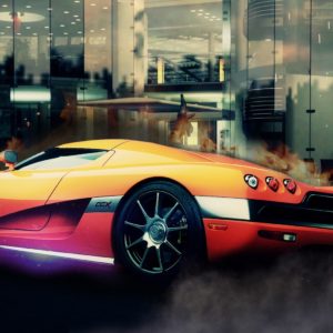 download Orange Koenigsegg CCX in Front of Building | CARS