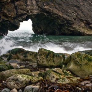 download Splashing against the rocks – HD Wallpapers